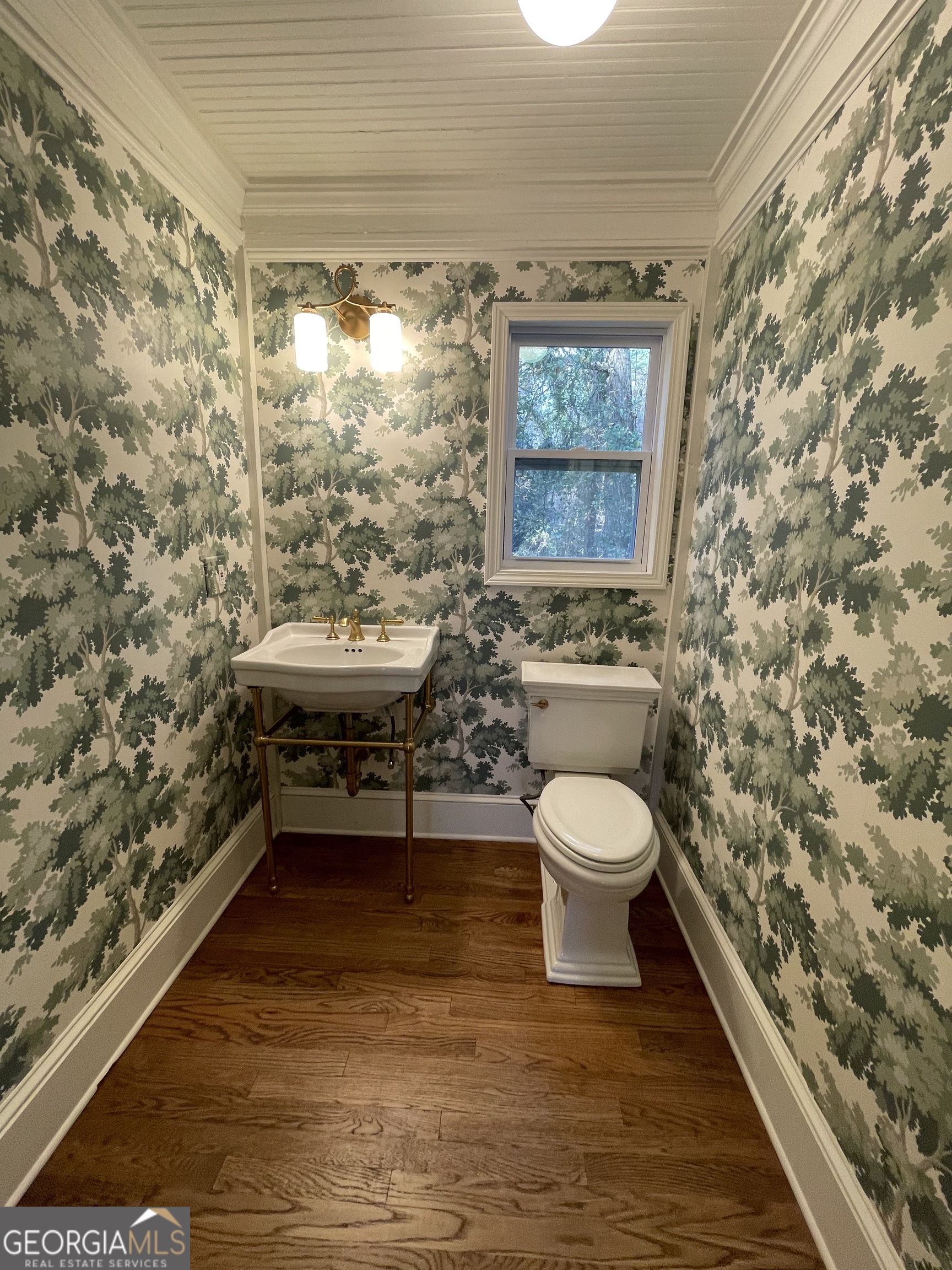 408 Thurston Avenue Thomaston, GA 30286 - Photo 39 of 51 a bathroom with a toilet and a shower curtain