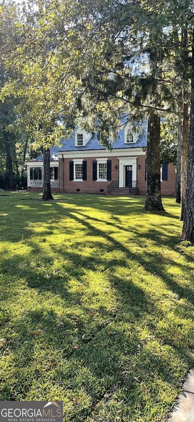408 Thurston Avenue Thomaston, GA 30286 - Photo 50 of 51 a front view of a house with a garden