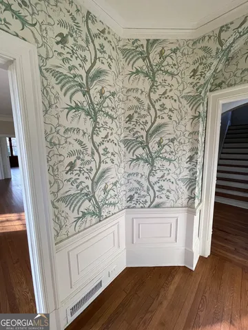 a view of a entryway with wooden floor