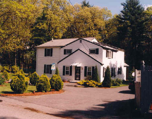 5 Rural Avenue Billerica, MA 01821 - Photo 1 of 1 a front view of a house with garden