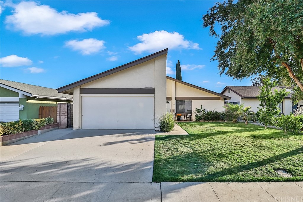 3988 Frandon Court Simi Valley, CA 93063 - Photo 1 of 1 a front view of a house with a yard and potted plants