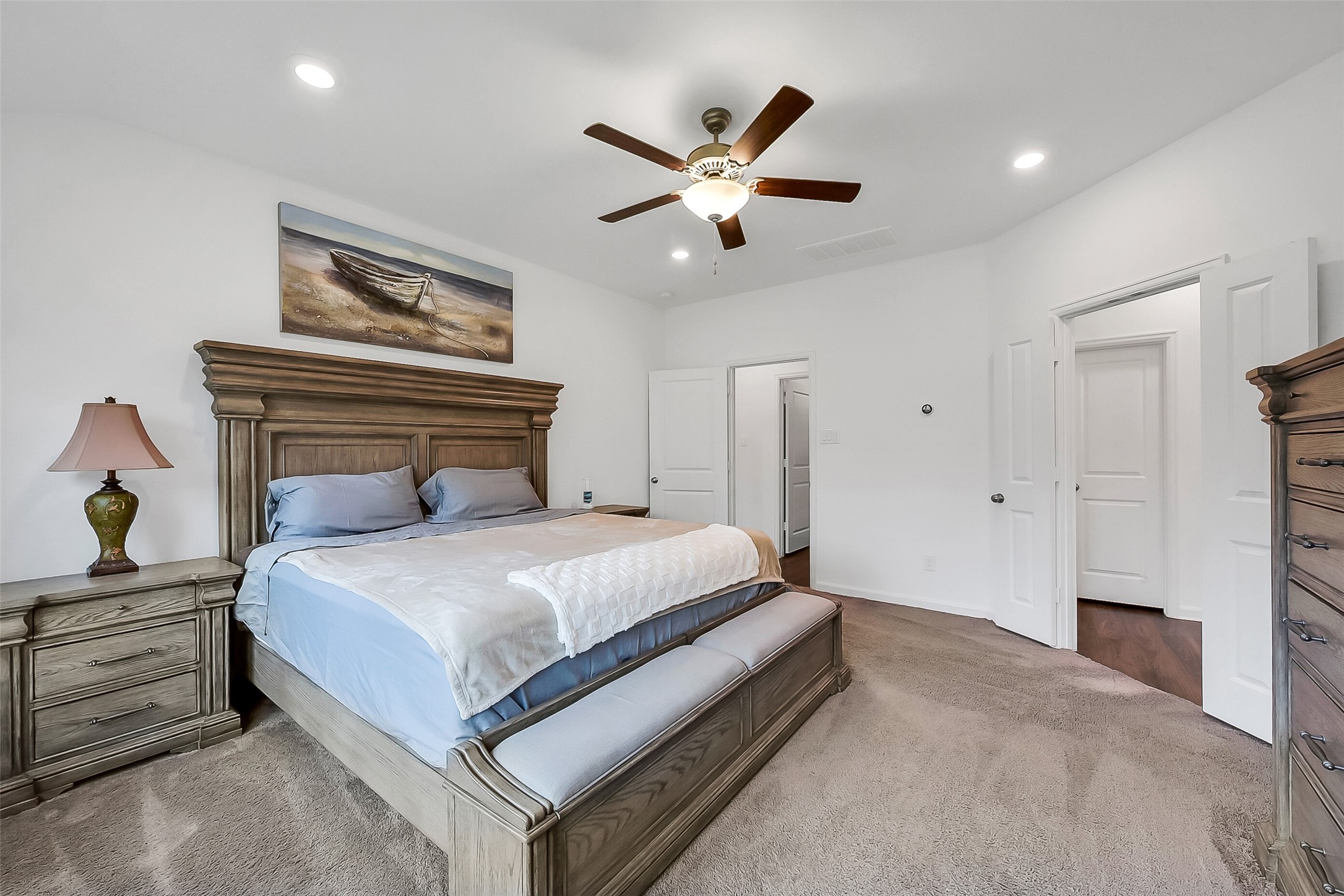 1004 Bulwark Crosby, TX 77532 - Photo 15 of 29 a bedroom with a bed and a ceiling fan