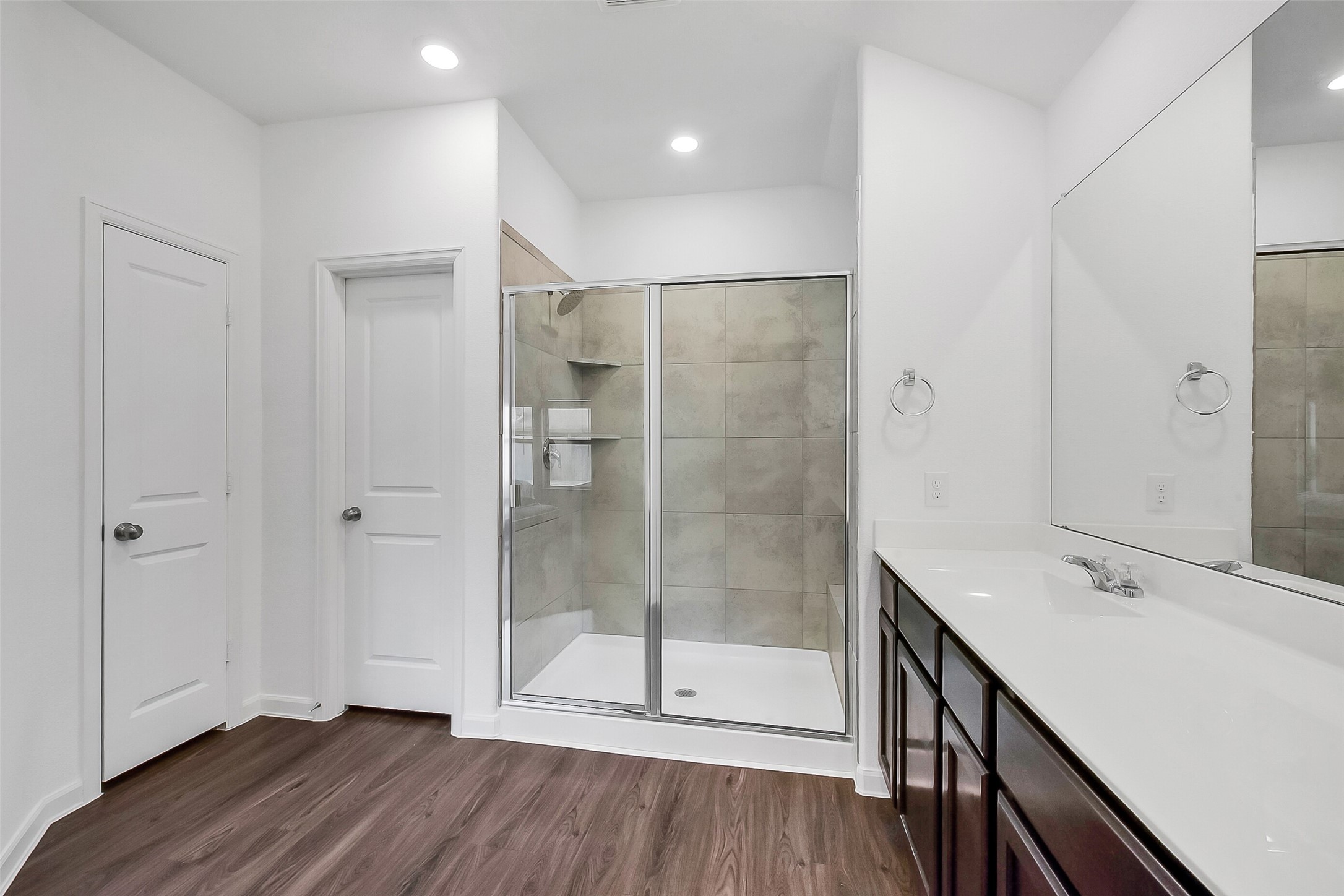 1004 Bulwark Crosby, TX 77532 - Photo 18 of 29 a bathroom with a shower and a sink