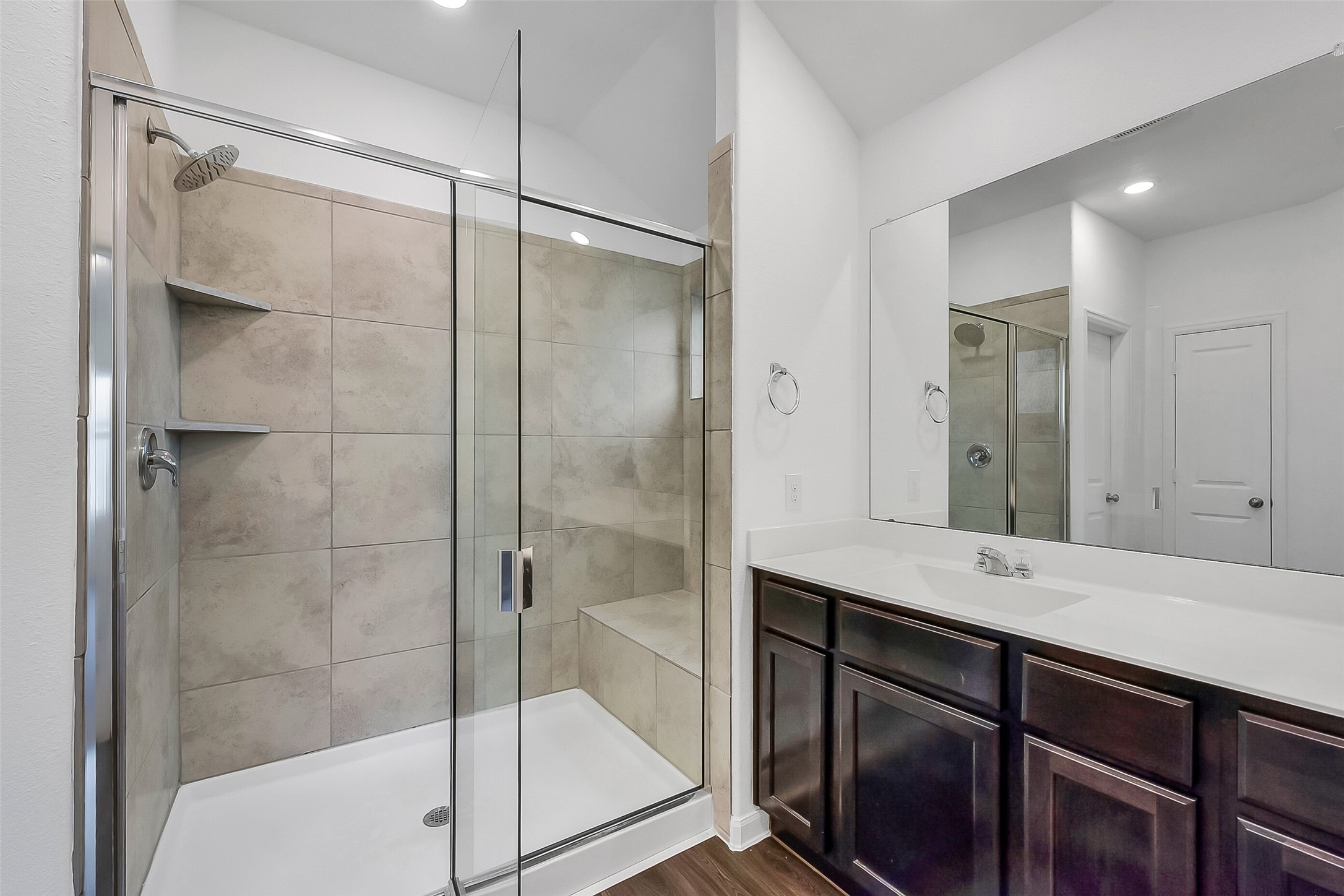 1004 Bulwark Crosby, TX 77532 - Photo 19 of 29 a bathroom with a shower sink and mirror