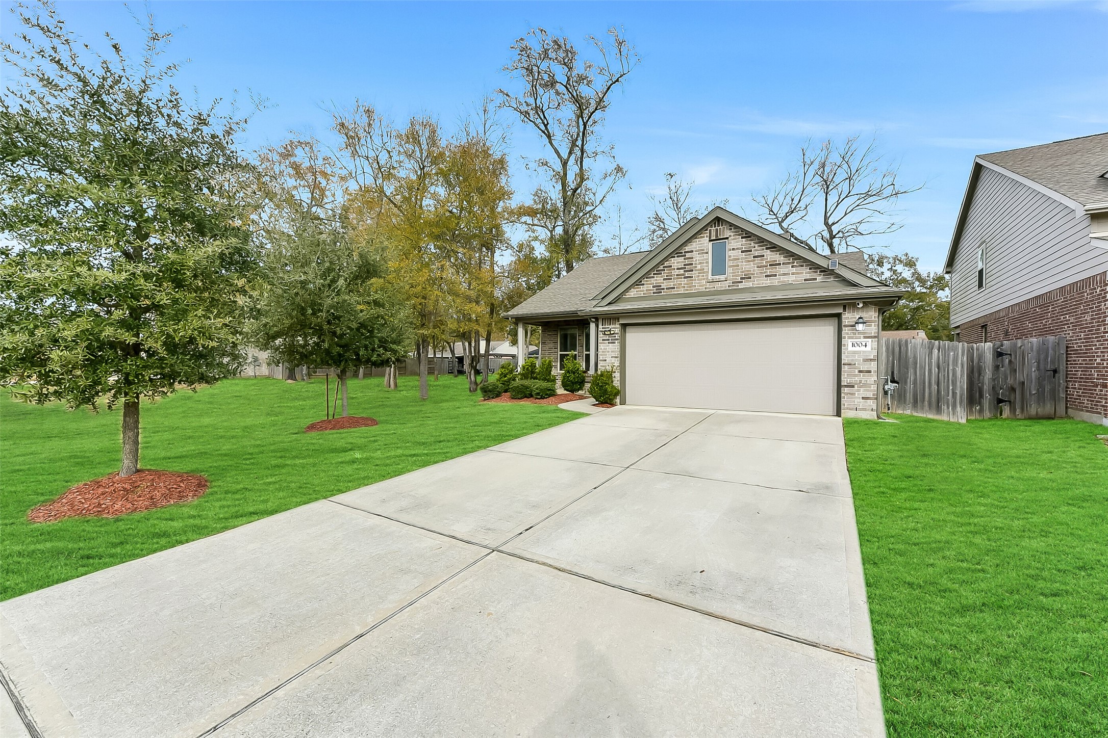 1004 Bulwark Crosby, TX 77532 - Photo 26 of 29 a front view of a house with a yard