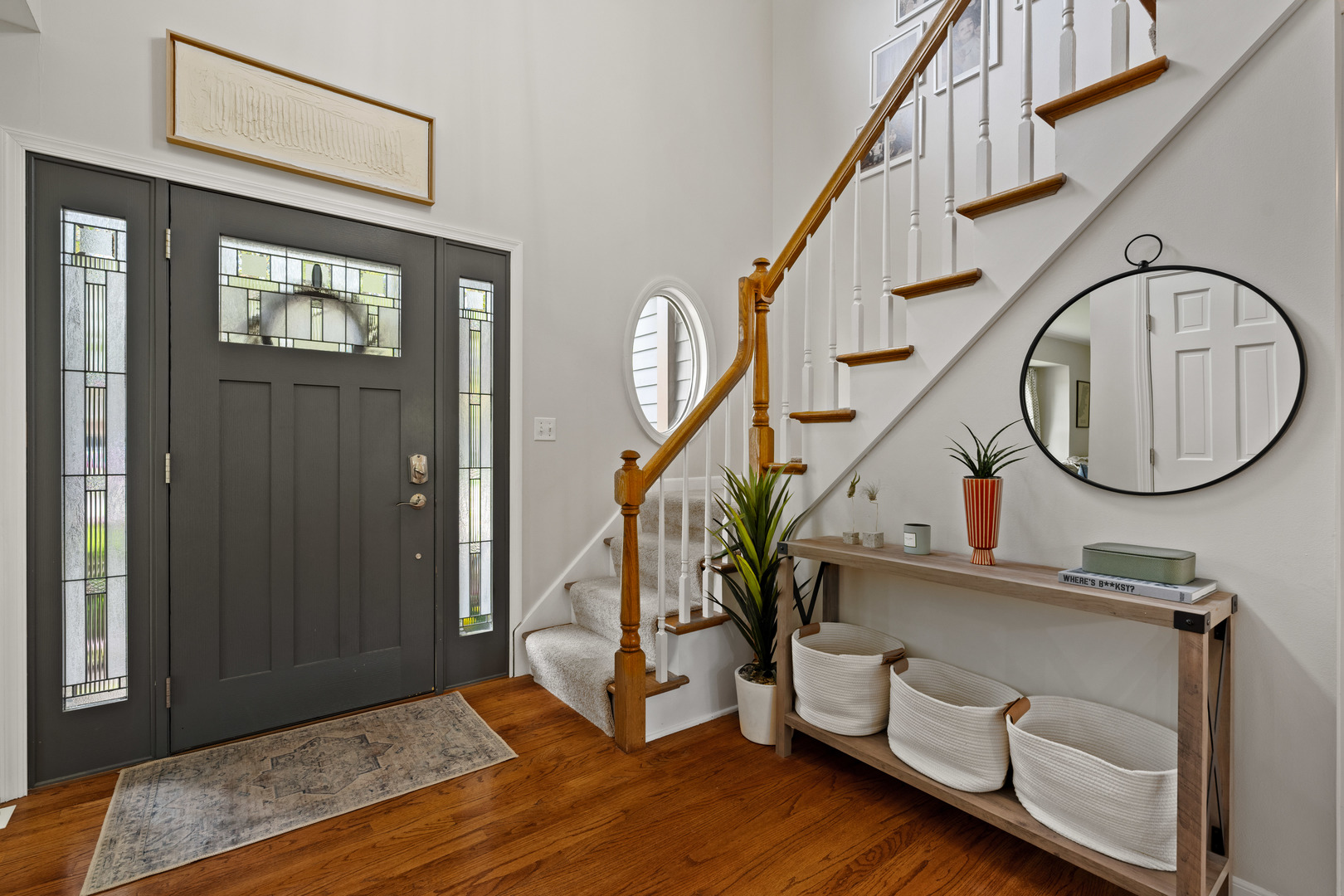 1115 Fagan Road Batavia, IL 60510 - Photo 3 of 33 a view of an entryway with wooden floor and front door