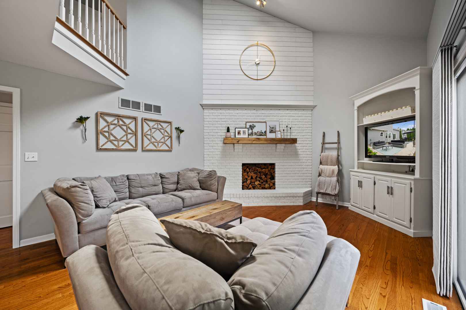 1115 Fagan Road Batavia, IL 60510 - Photo 5 of 33 a living room with furniture and a fireplace