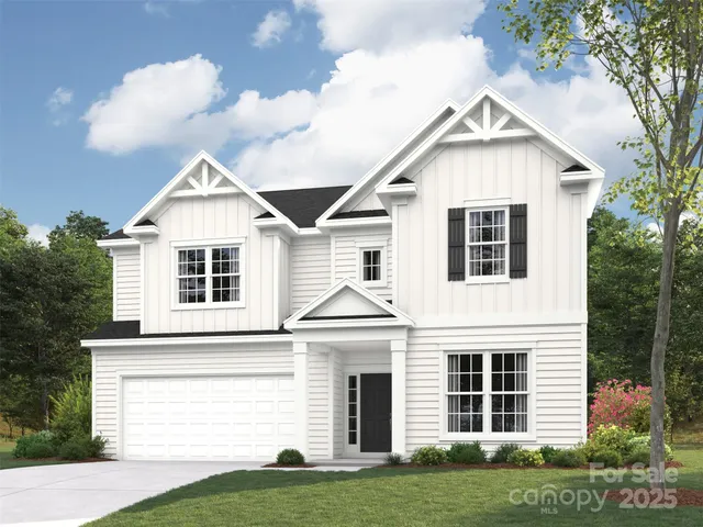 a view of a house with yard