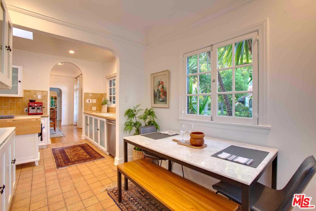 6354 Warner Drive Los Angeles, CA 90048 - Photo 16 of 43 a view of a living room and a window