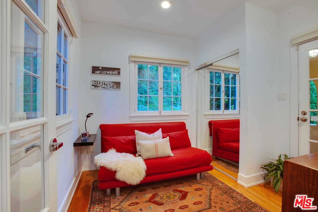 6354 Warner Drive Los Angeles, CA 90048 - Photo 31 of 43 a living room with furniture and a couch
