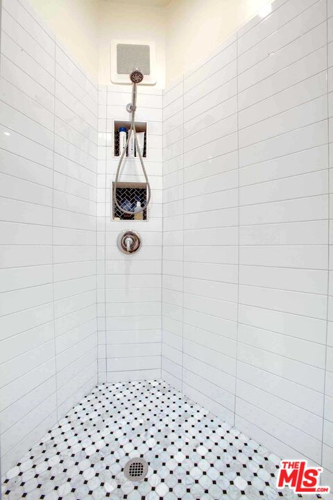 6354 Warner Drive Los Angeles, CA 90048 - Photo 39 of 43 a bathroom with a shower