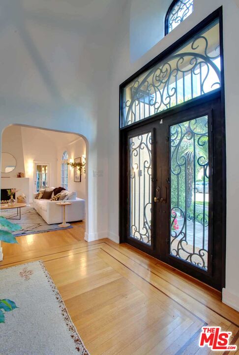 6354 Warner Drive Los Angeles, CA 90048 - Photo 4 of 43 a view of an entryway with a fireplace