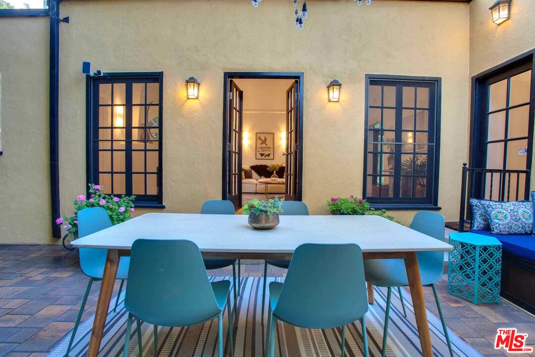 6354 Warner Drive Los Angeles, CA 90048 - Photo 9 of 43 a view of a dining room with furniture and wooden floor