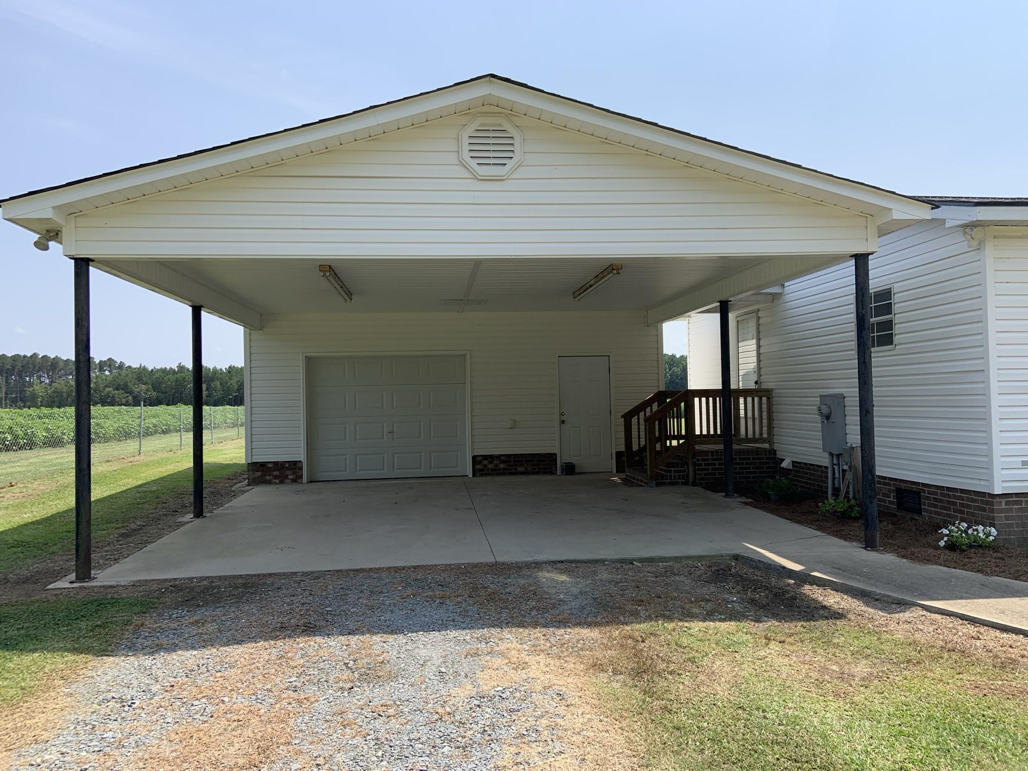 202 Cattle Run Way Pooler, GA 31322 - Photo 4 of 27 Carport and Garage