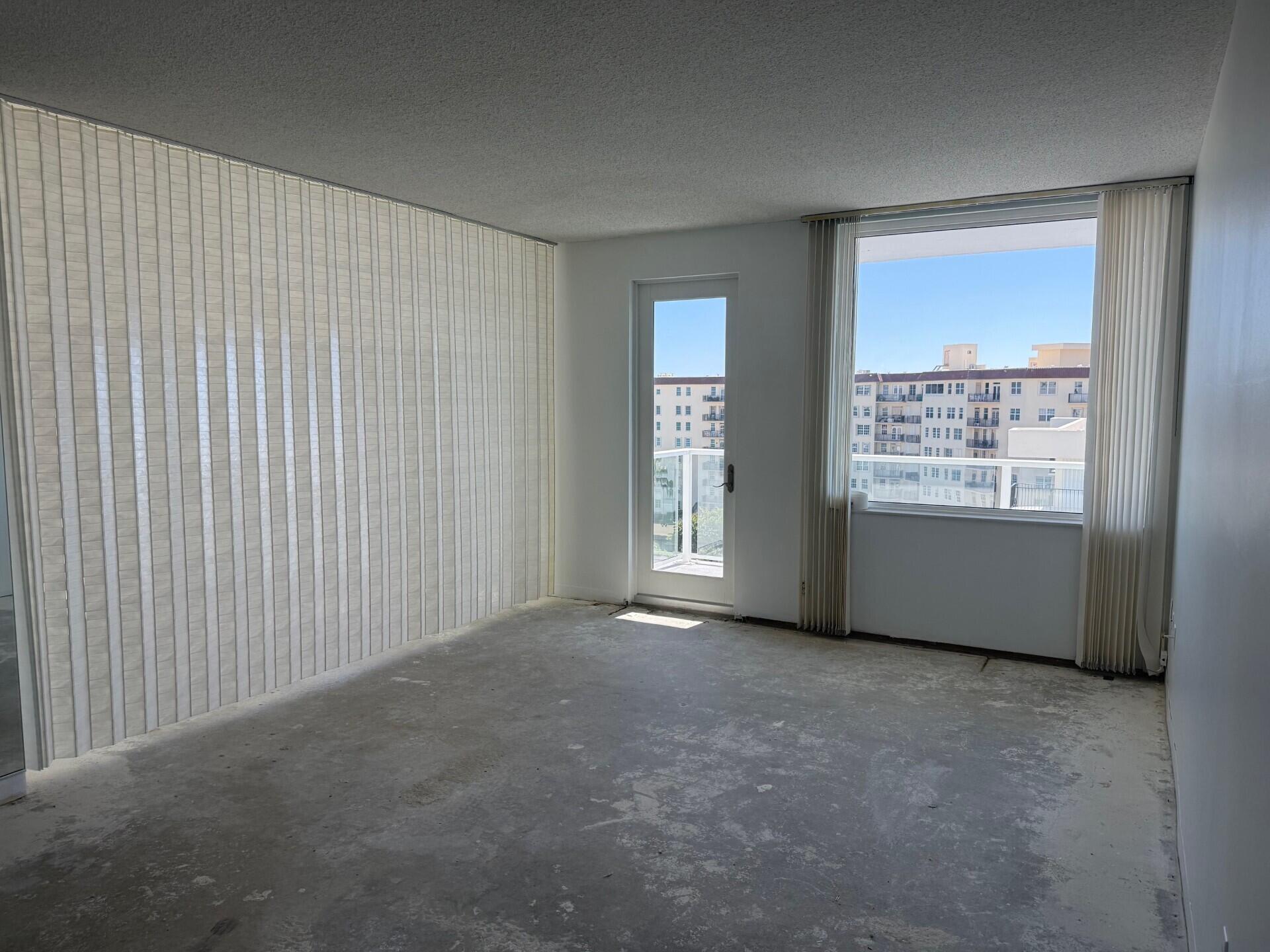 3450 South Ocean Boulevard, Unit 819 Palm Beach, FL 33480 - Photo 12 of 37 a view of an empty room with a window