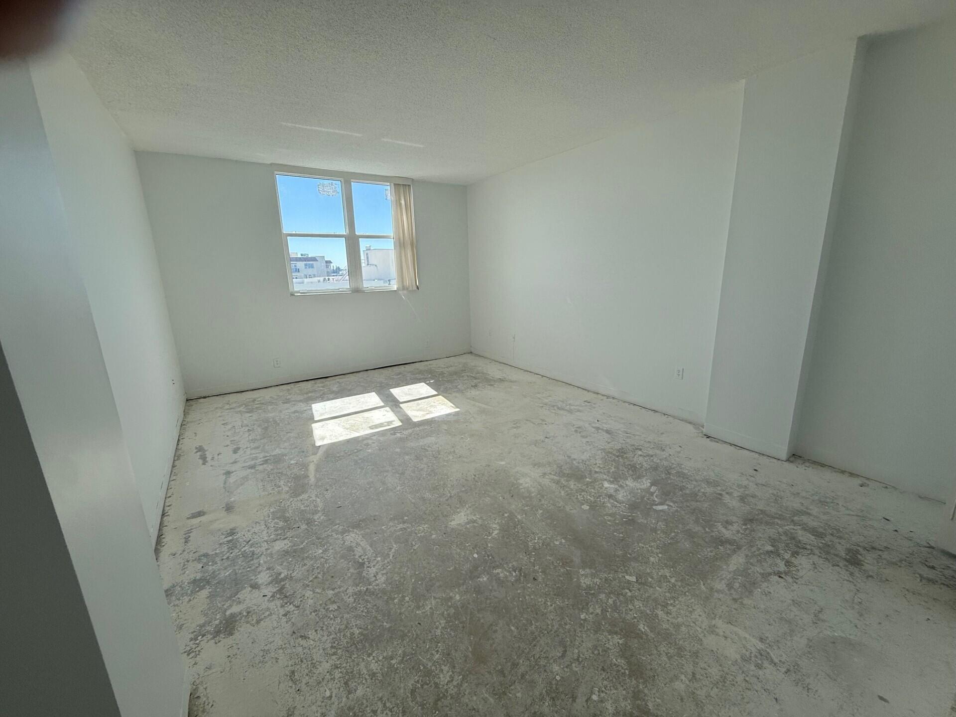 3450 South Ocean Boulevard, Unit 819 Palm Beach, FL 33480 - Photo 16 of 37 an empty room with windows