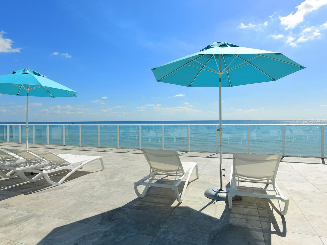 3450 South Ocean Boulevard, Unit 819 Palm Beach, FL 33480 - Photo 27 of 37 a view of a swimming pool with a patio