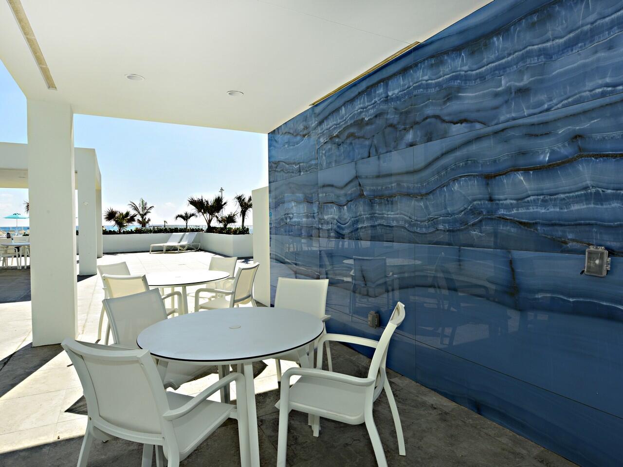 3450 South Ocean Boulevard, Unit 819 Palm Beach, FL 33480 - Photo 33 of 37 a view of a dining room with furniture