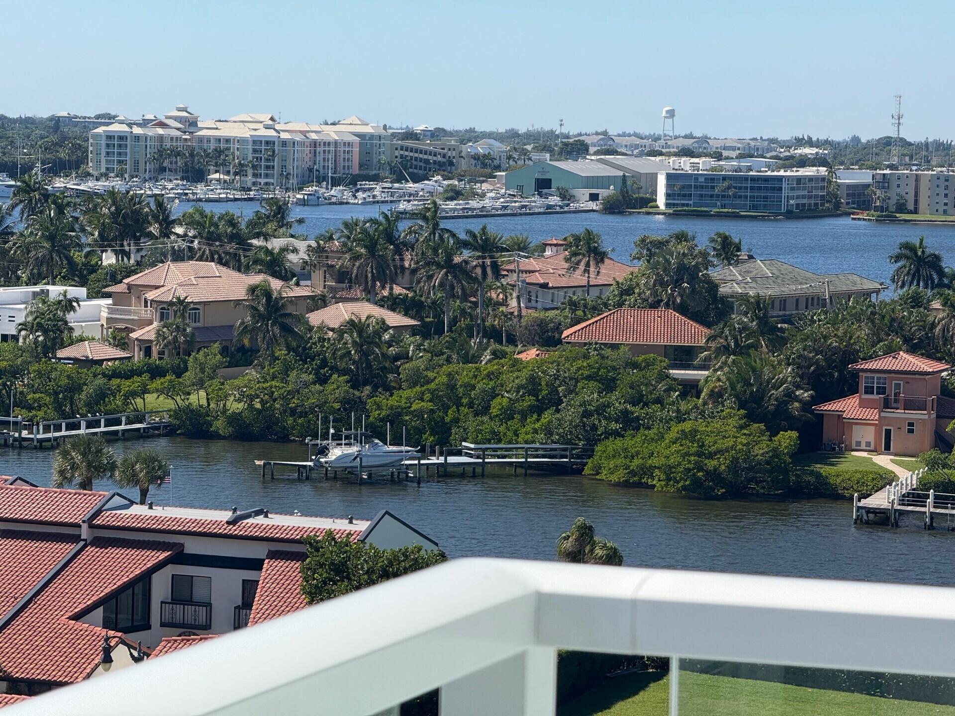 3450 South Ocean Boulevard, Unit 819 Palm Beach, FL 33480 - Photo 8 of 37 a view of a lake with a cars park