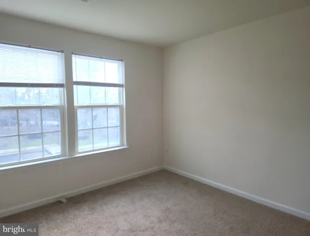 a bathroom with a sink a toilet and bathtub