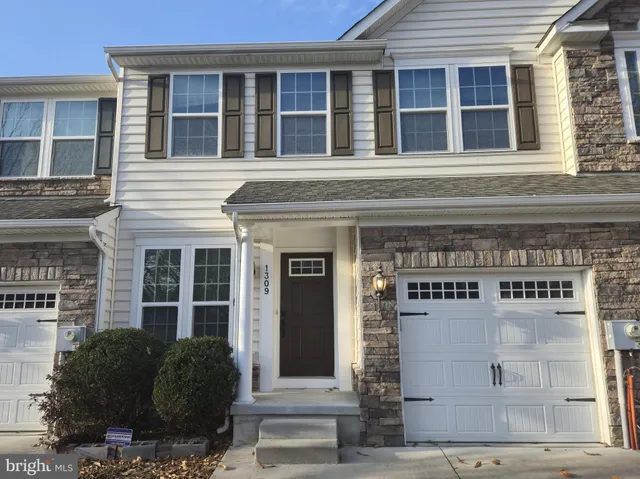 a front view of a building with windows