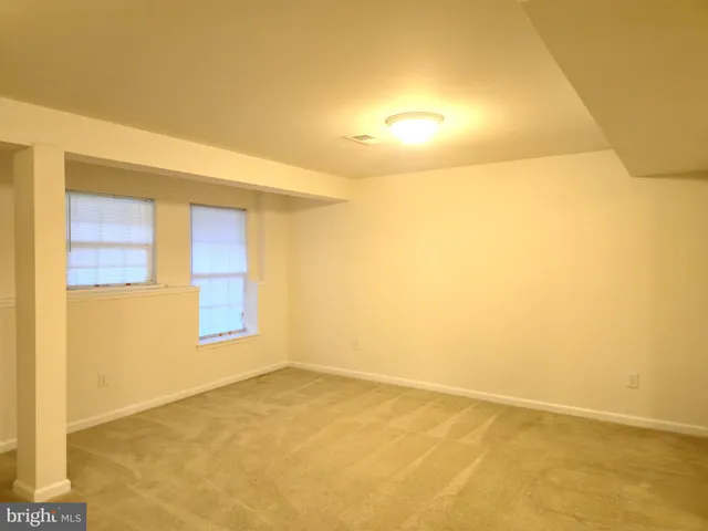 a view of balcony with wooden floor