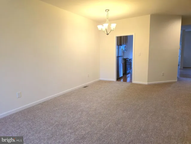 a view of a room with a chandelier