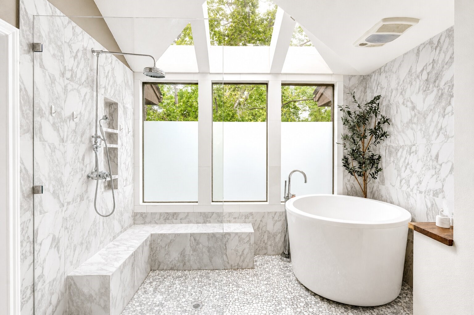 201 Vanderpool Lane, Unit 130 Houston, TX 77024 - Photo 27 of 41 The masterfully designed 'wet room' includes a large shower with marble floor-to-ceiling cladding, ample bench and Japanese soaking tub. The triple windows and skylights that hover above, create an atrium-like feel.