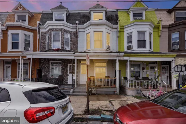 a front view of a building with many windows