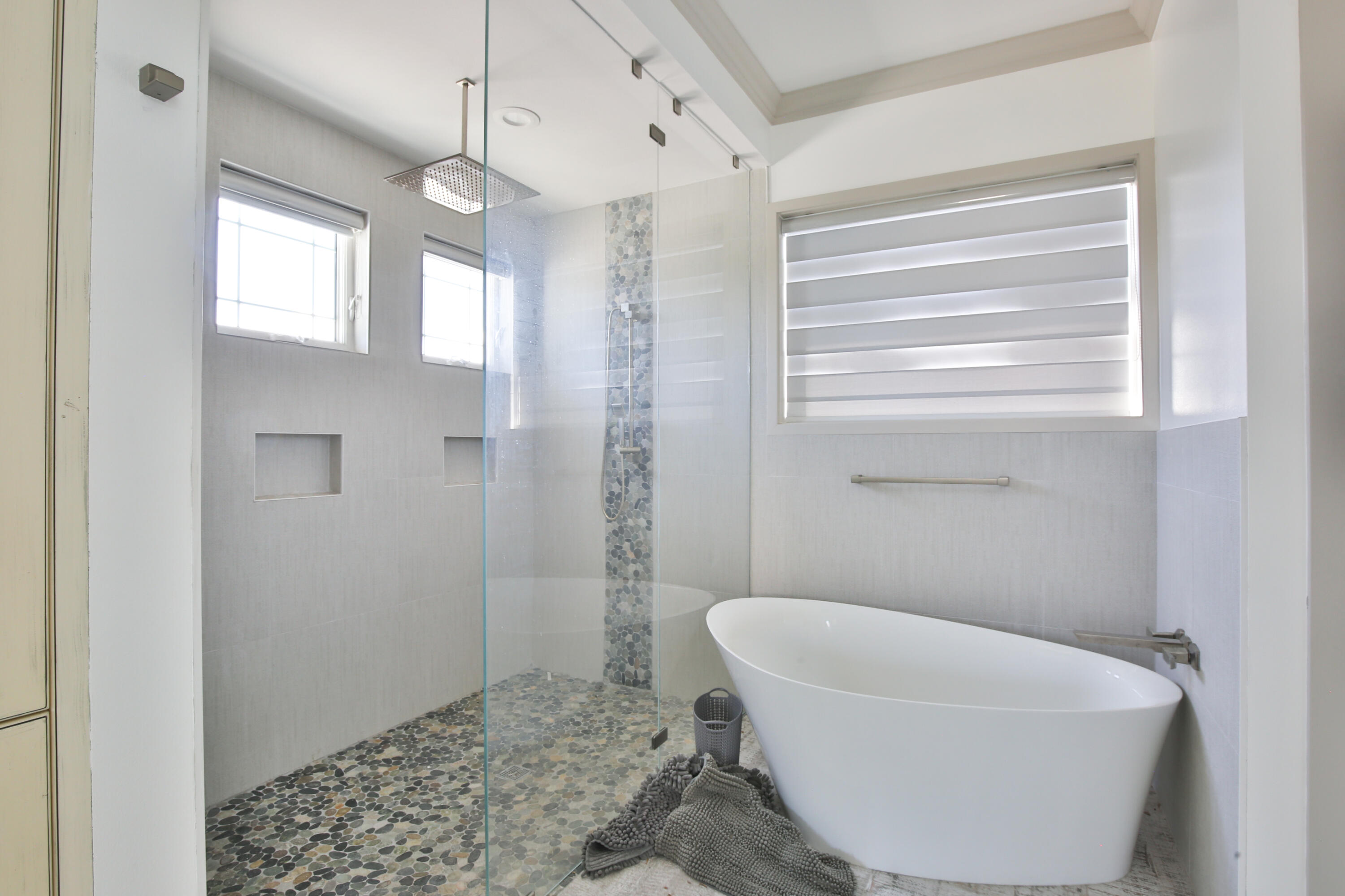 7816 Sanderling Road Sarasota, FL 34242 - Photo 17 of 34 a bathroom with a toilet and a shower