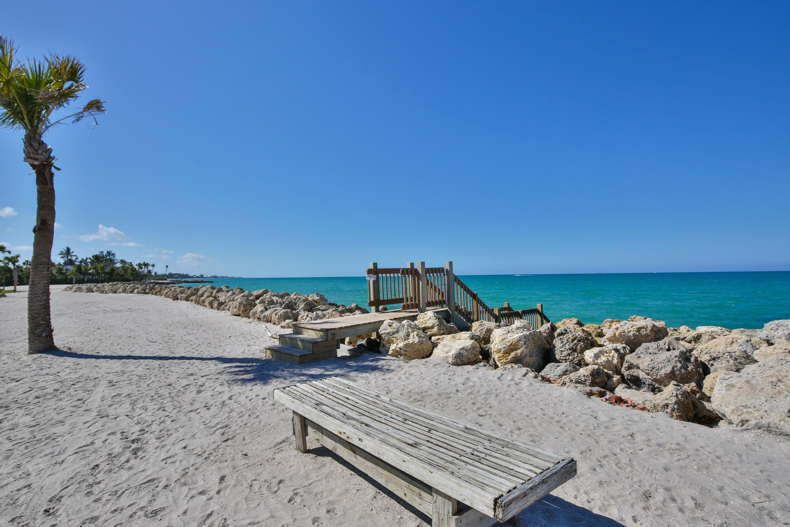 7816 Sanderling Road Sarasota, FL 34242 - Photo 29 of 34 a view of a terrace with chairs