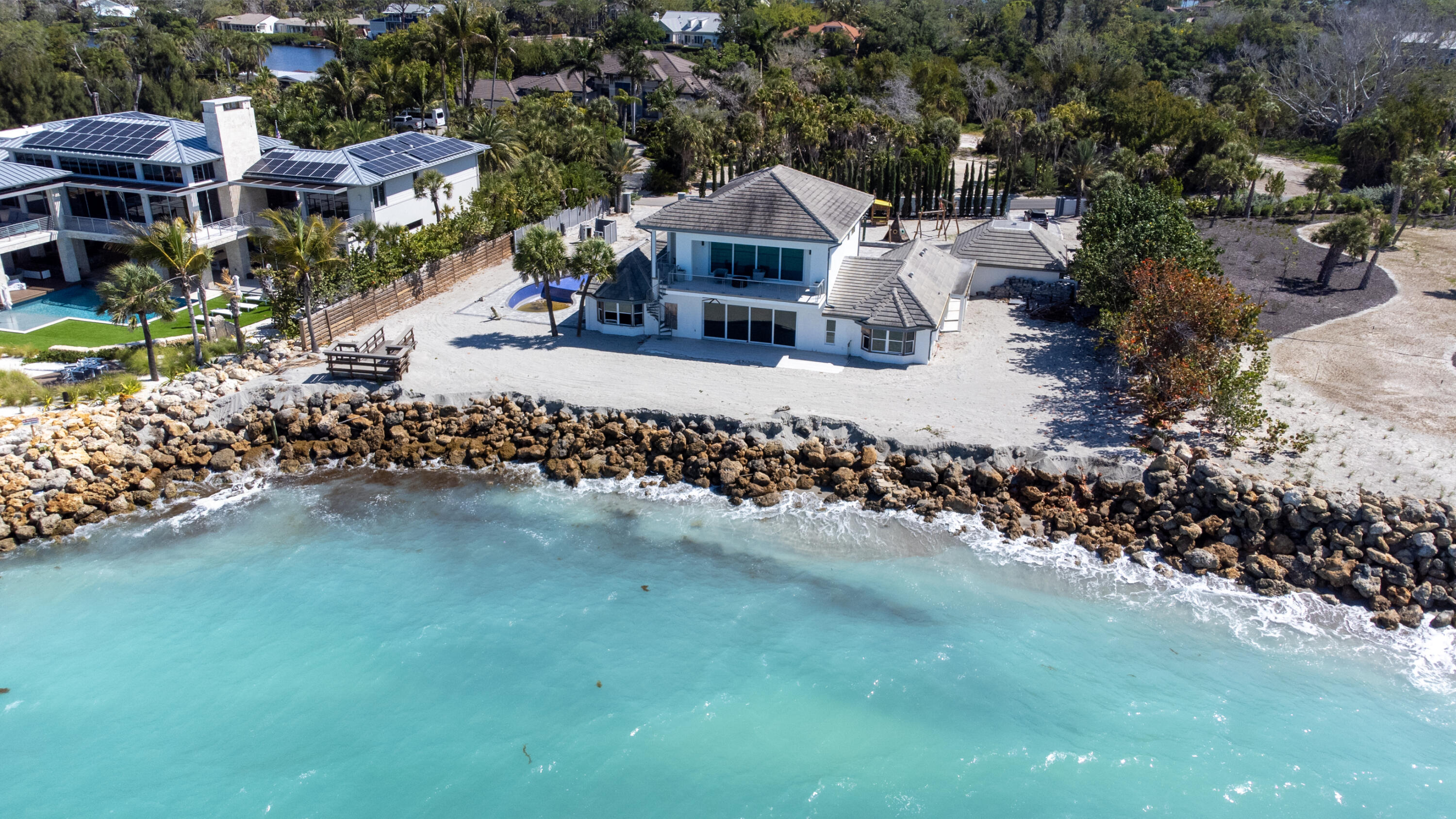 7816 Sanderling Road Sarasota, FL 34242 - Photo 33 of 34 an aerial view of a house with a yard basket ball court and outdoor seating
