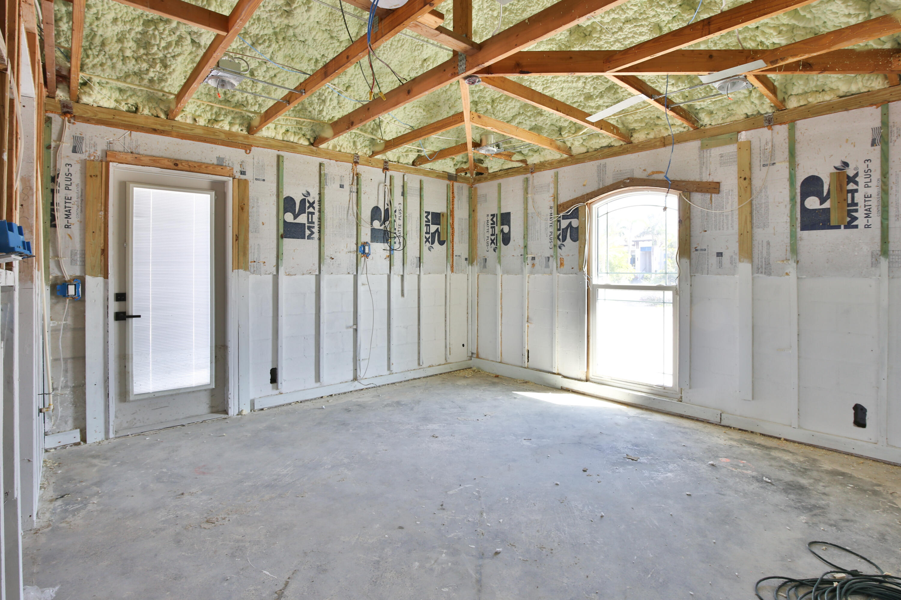 7816 Sanderling Road Sarasota, FL 34242 - Photo 7 of 34 a view of a room with wooden walls