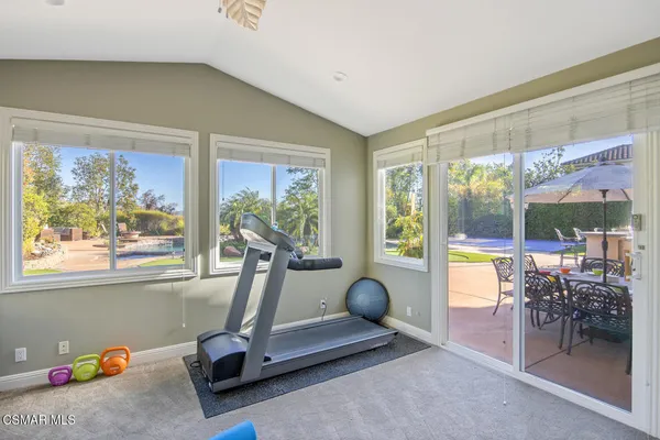 a bathroom with a bathtub and window