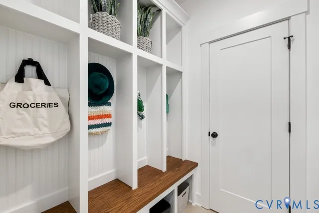 a view of kitchen with furniture and wooden floor