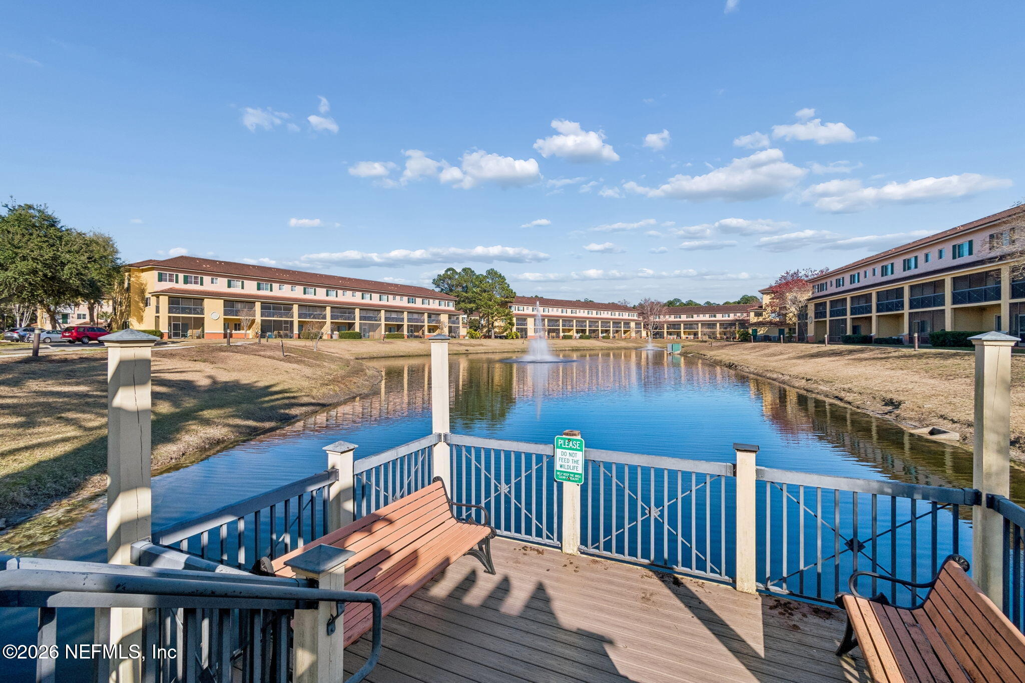 9745 Touchton Road, Unit 2903 Jacksonville, FL 32246 - Photo 124 of 155 a balcony with wooden floor and city view