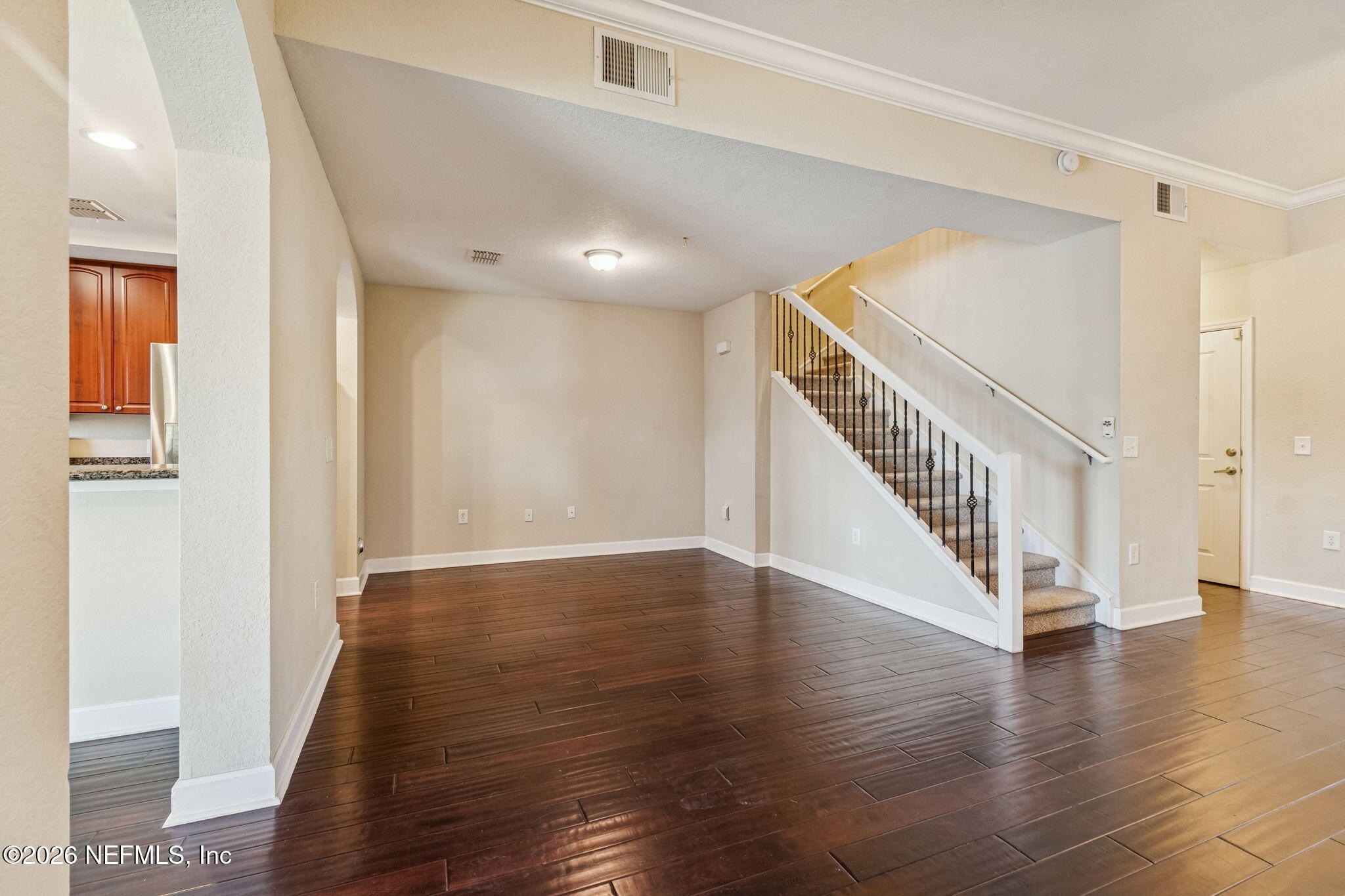 9745 Touchton Road, Unit 2903 Jacksonville, FL 32246 - Photo 13 of 155 a view of an entryway with wooden floor