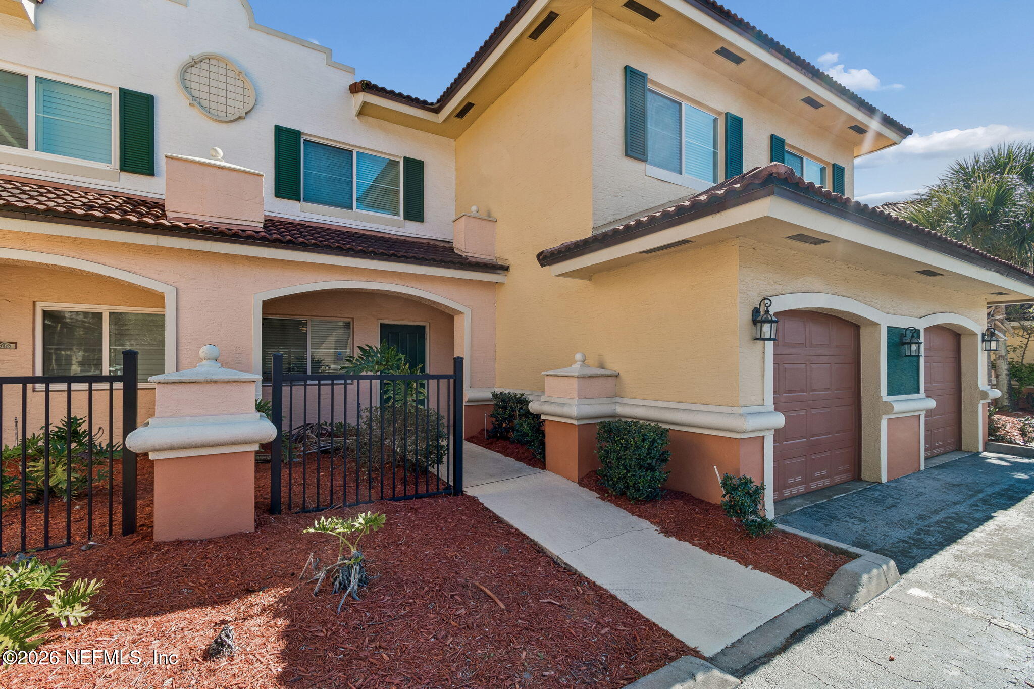 9745 Touchton Road, Unit 2903 Jacksonville, FL 32246 - Photo 5 of 155 a front view of a house with a yard