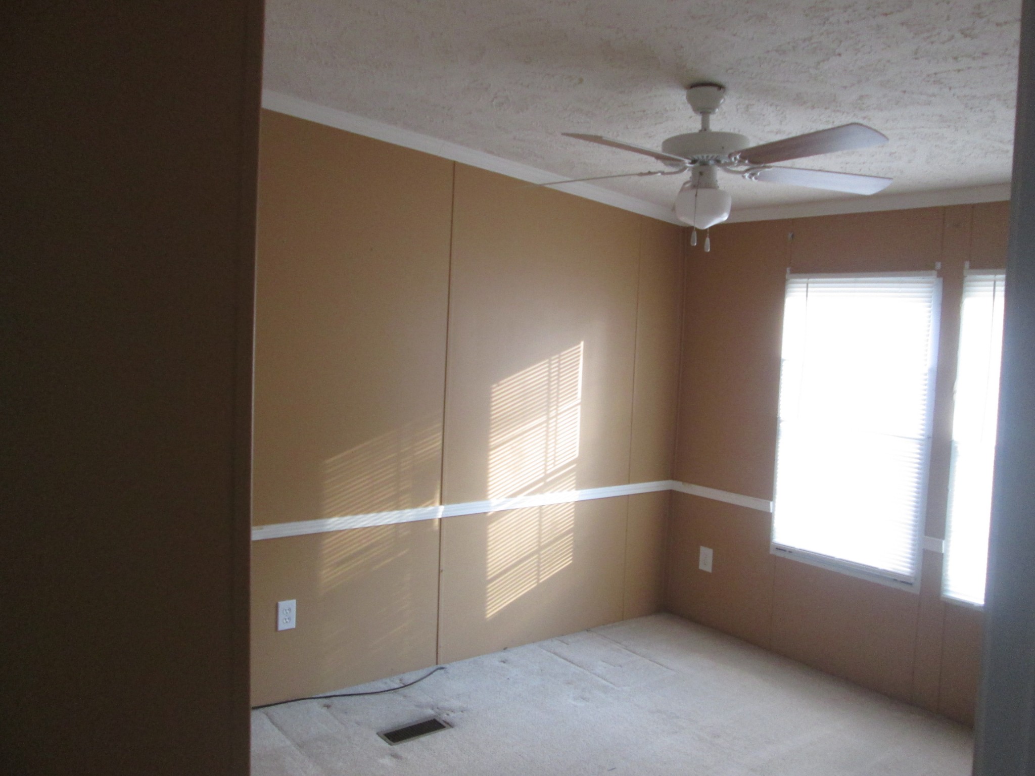 321 Manzano Road Madison, TN 37115 - Photo 7 of 16 a view of an empty room with a window
