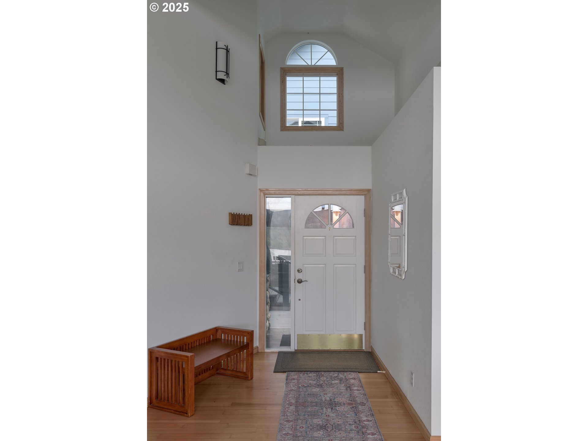 84284 Alder Drive Florence, OR 97439 - Photo 26 of 43 a view of a hallway with windows and brick walls