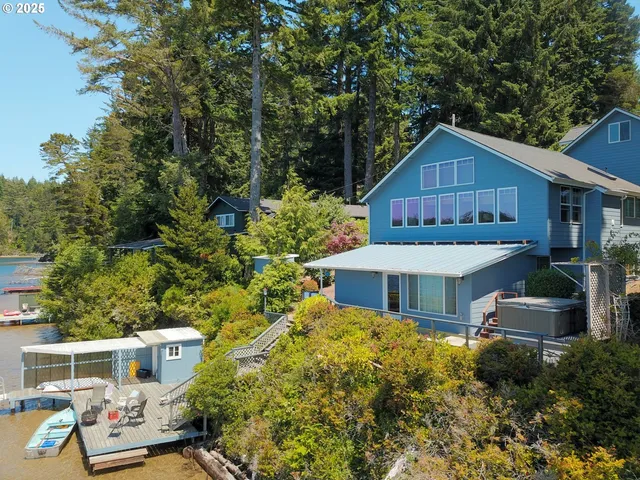 a view of a lake with a house in the background