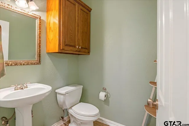 a room with furniture and book shelf
