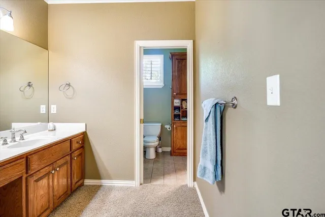 a living room with furniture a window and a projector