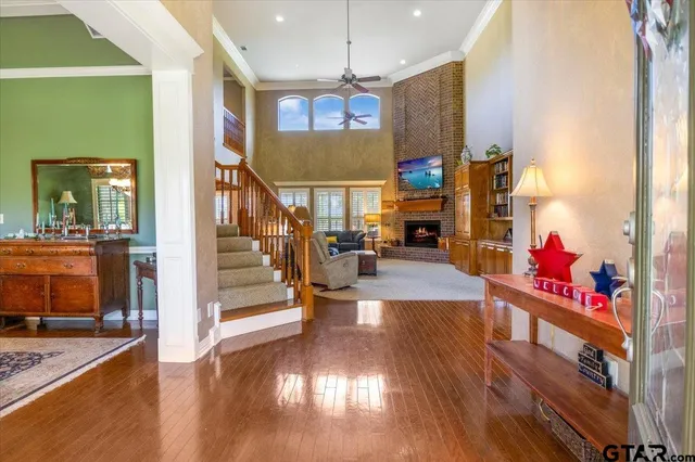 a view of a living room and entry way