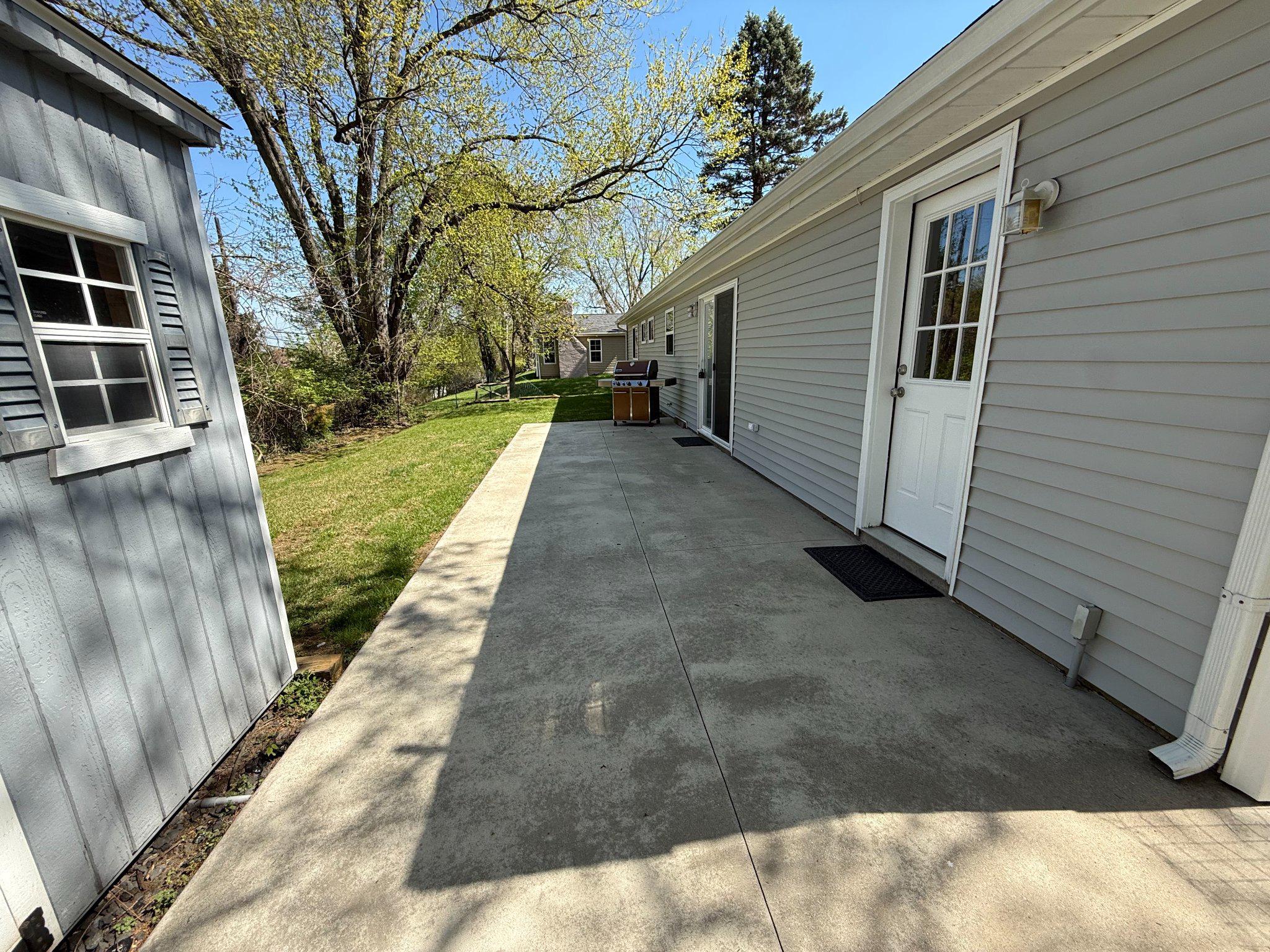1107 Cromwell Road Glenside, PA 19038 - Photo 20 of 28 Sunny back yard with lush greenery.