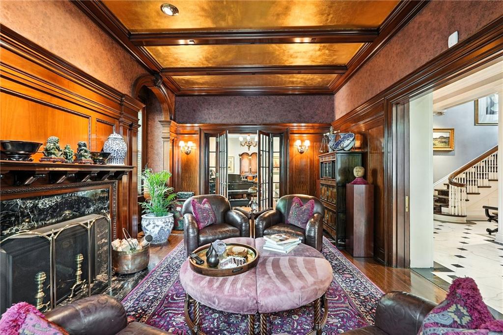 400 Devonshire Street Pittsburgh, PA 15213 - Photo 11 of 49 a living room with furniture and a fireplace