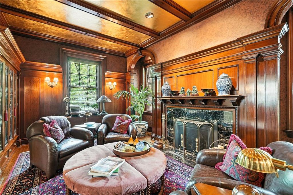 400 Devonshire Street Pittsburgh, PA 15213 - Photo 12 of 49 a living room with furniture and a fireplace