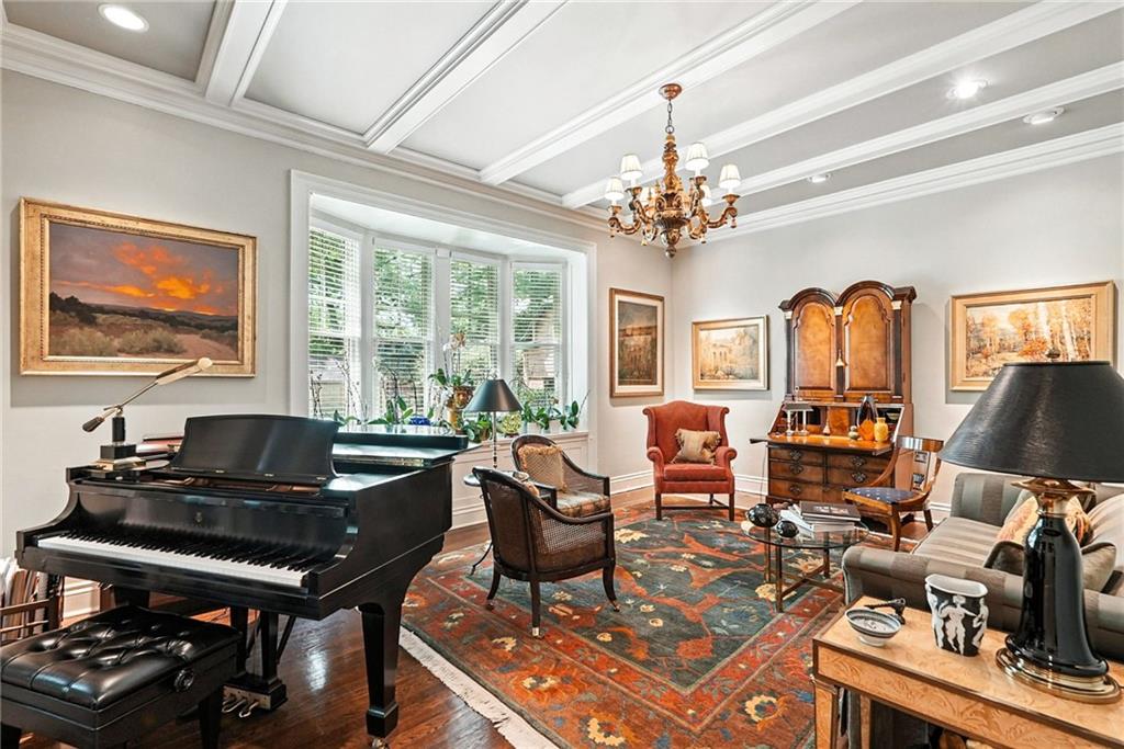 400 Devonshire Street Pittsburgh, PA 15213 - Photo 14 of 49 a living room with lots of furniture and a chandelier