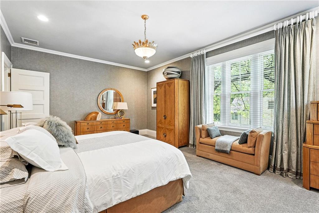 400 Devonshire Street Pittsburgh, PA 15213 - Photo 25 of 49 a bedroom with a bed couch and a window