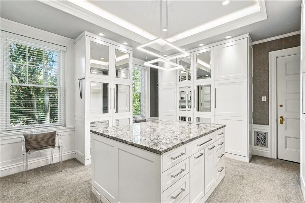 400 Devonshire Street Pittsburgh, PA 15213 - Photo 27 of 49 a bathroom with a granite countertop sink and a large mirror